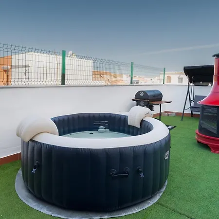 Atico En Pilas Piscina Y Jacuzzi Exterior photo